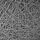 A close-up of the web-like structure created by nanospinning
